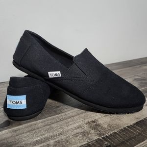 Black Toms, size 7W